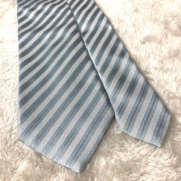 It's a beautiful light blue striped tie - Picture 2 of 2